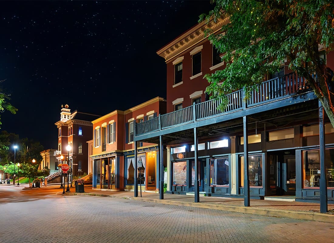 Plattsburg, MO - Illuminated Shops and Cafes on Historic Main Street